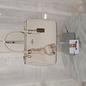 Coach 3pc EUC Mini Surrey Carryall With Gold Hangtag, Bag Charm, and Cherry Clip